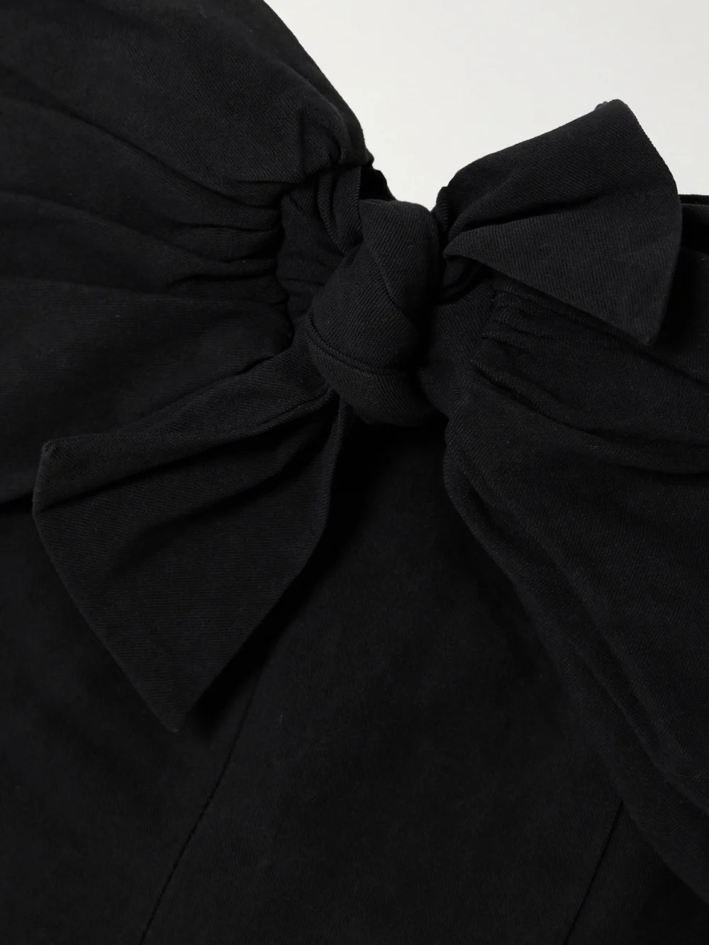 Close-up detail of the Tove Dipti Strapless Tie-front Stretch Linen and Cotton-blend Mini Dress