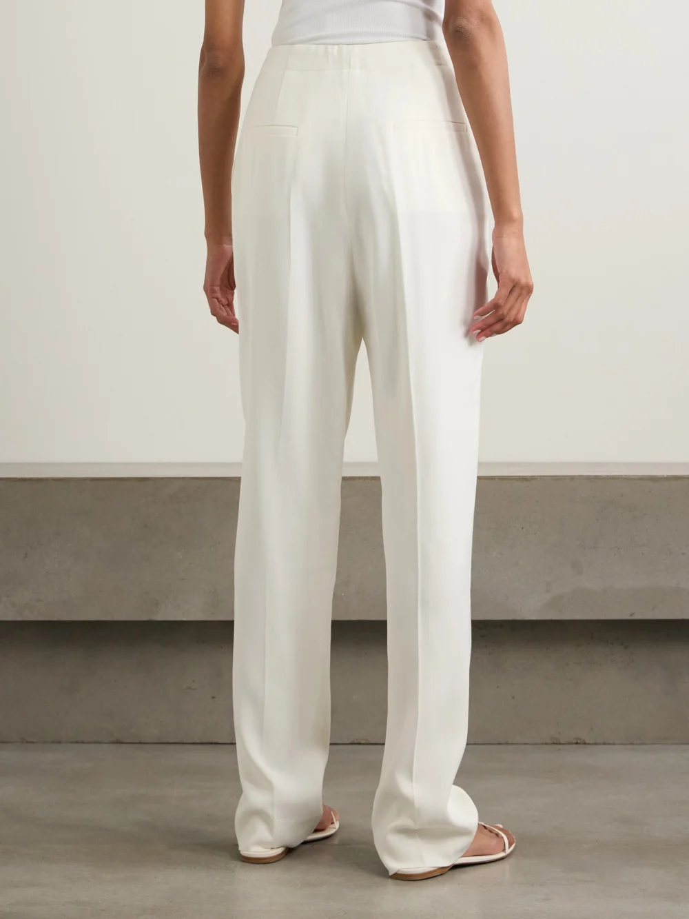 Back view of the Tove Emery Pleated Crepe Straight-leg Pants