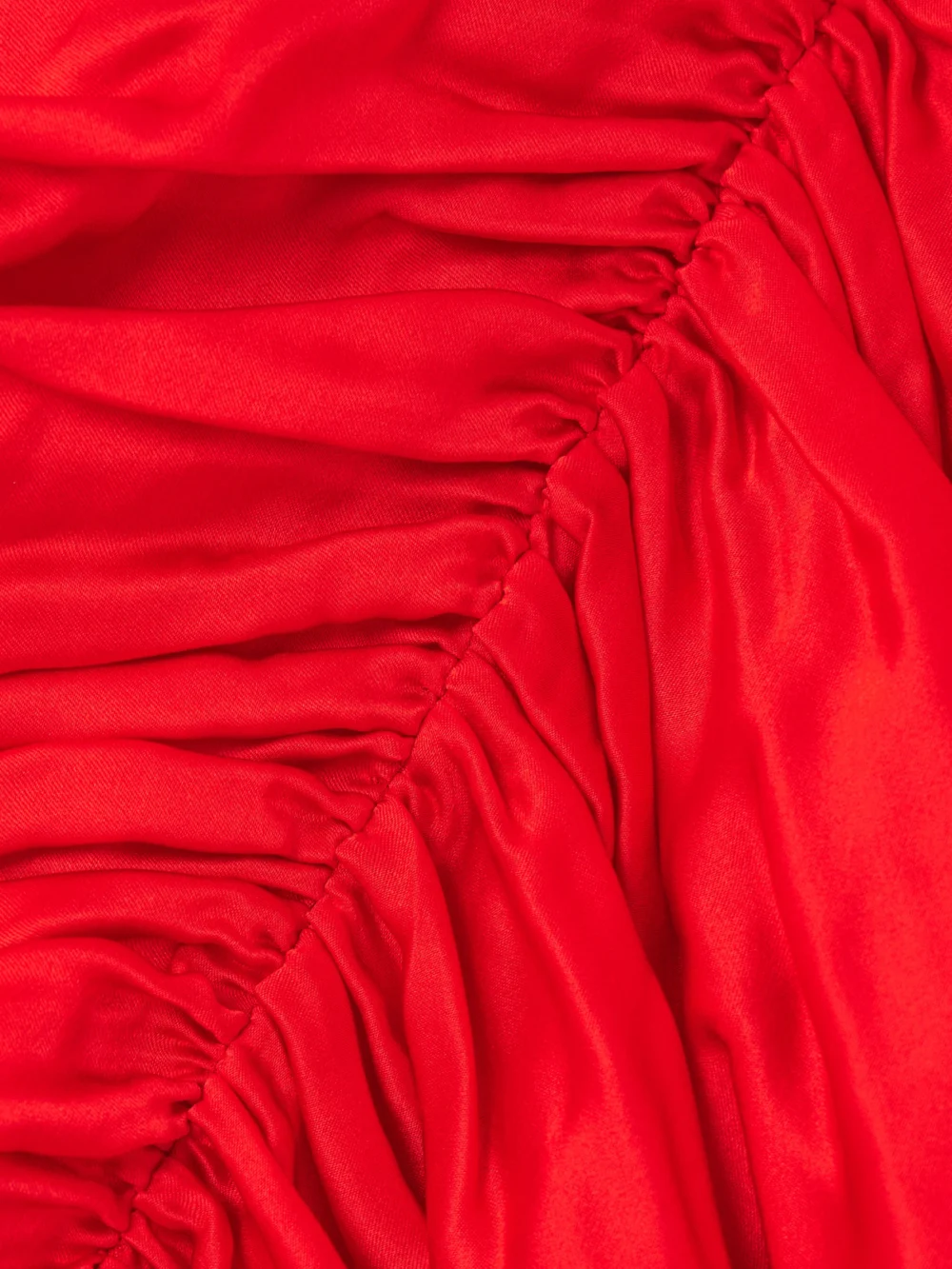 Close-up detail of the Tove Fiana Ruched Silk-satin Top