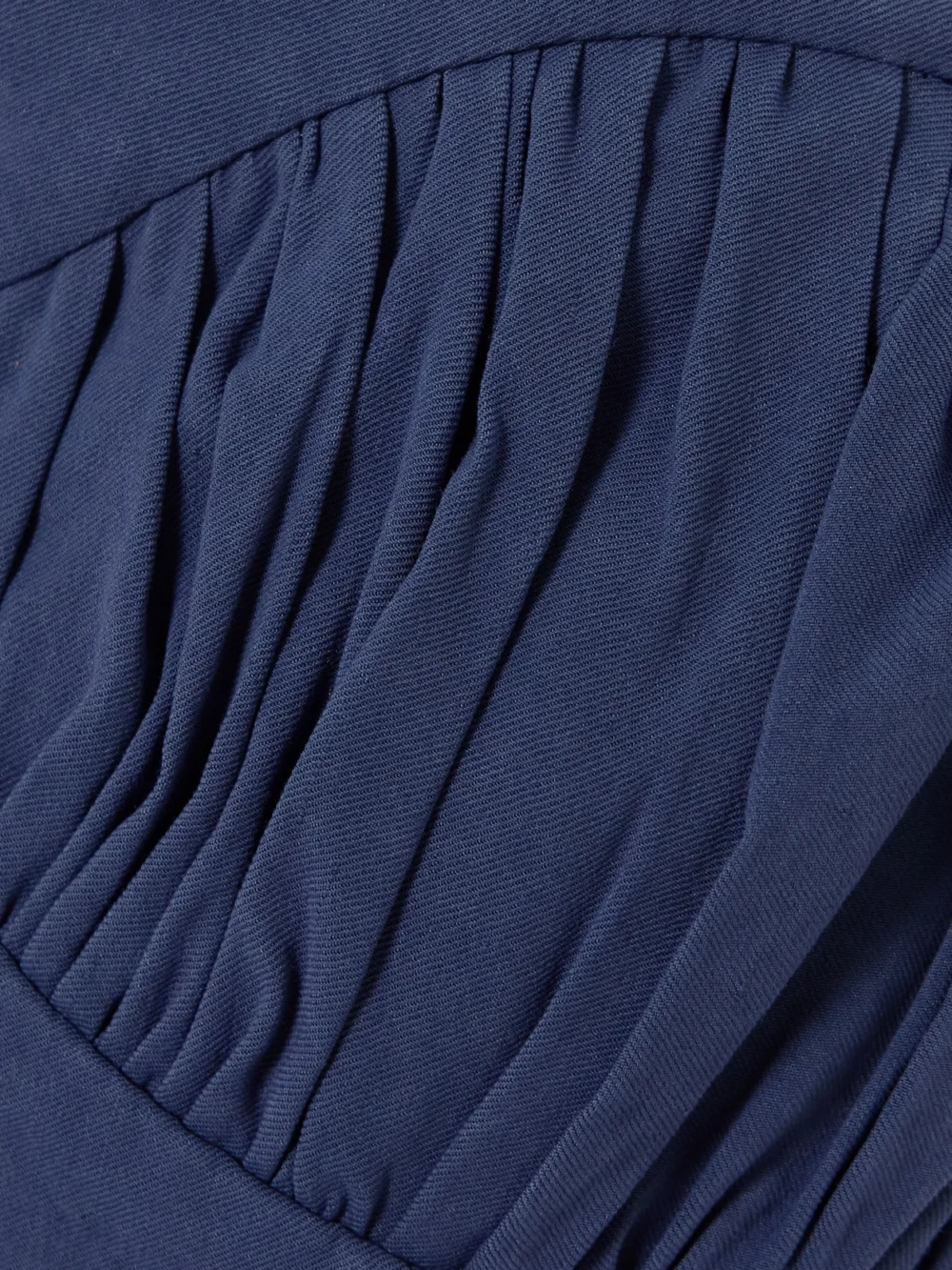 Close-up detail of the Tove Ruby Gathered Linen-blend Twill Peplum Bustier Top