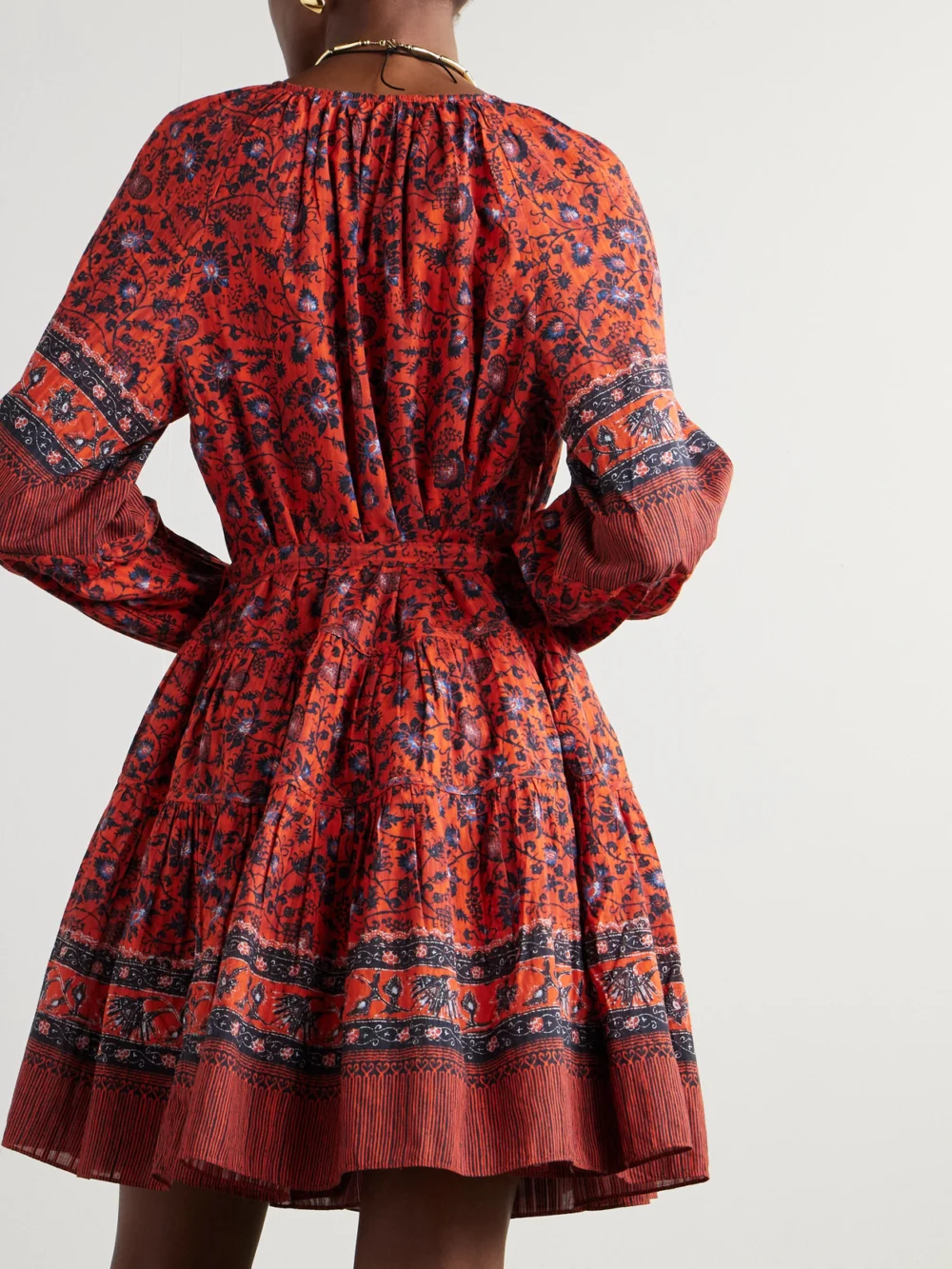 Back view of the Ulla Johnson Abri Belted Tiered Printed Cotton-blend Voile Mini Dress
