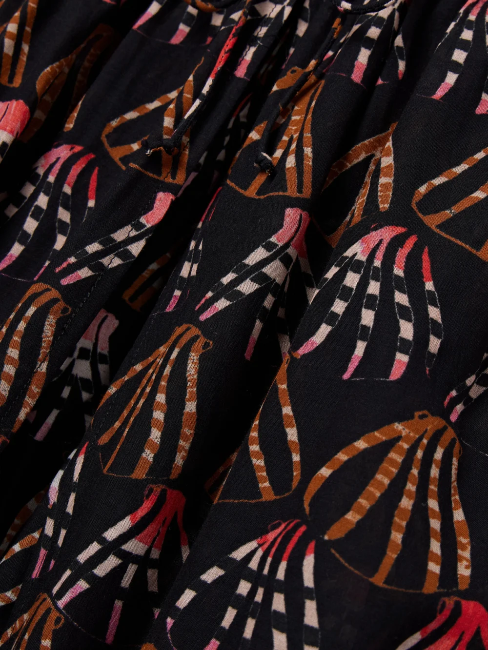 Close-up detail of the Ulla Johnson Asli Ruffled Printed Cotton-blend Voile Midi Dress