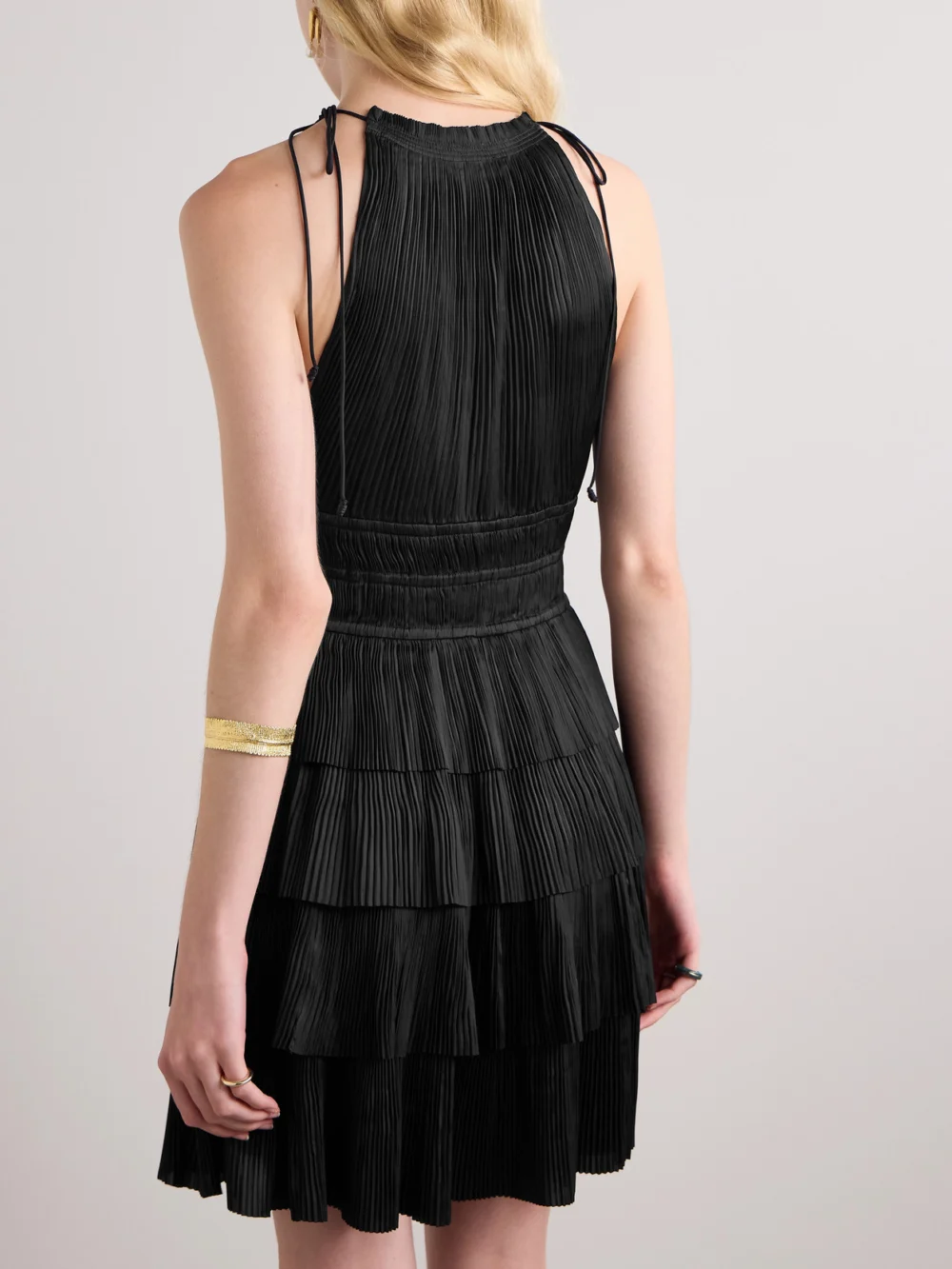 Back view of the Ulla Johnson Cecily Tiered Plissé-satin Mini Dress