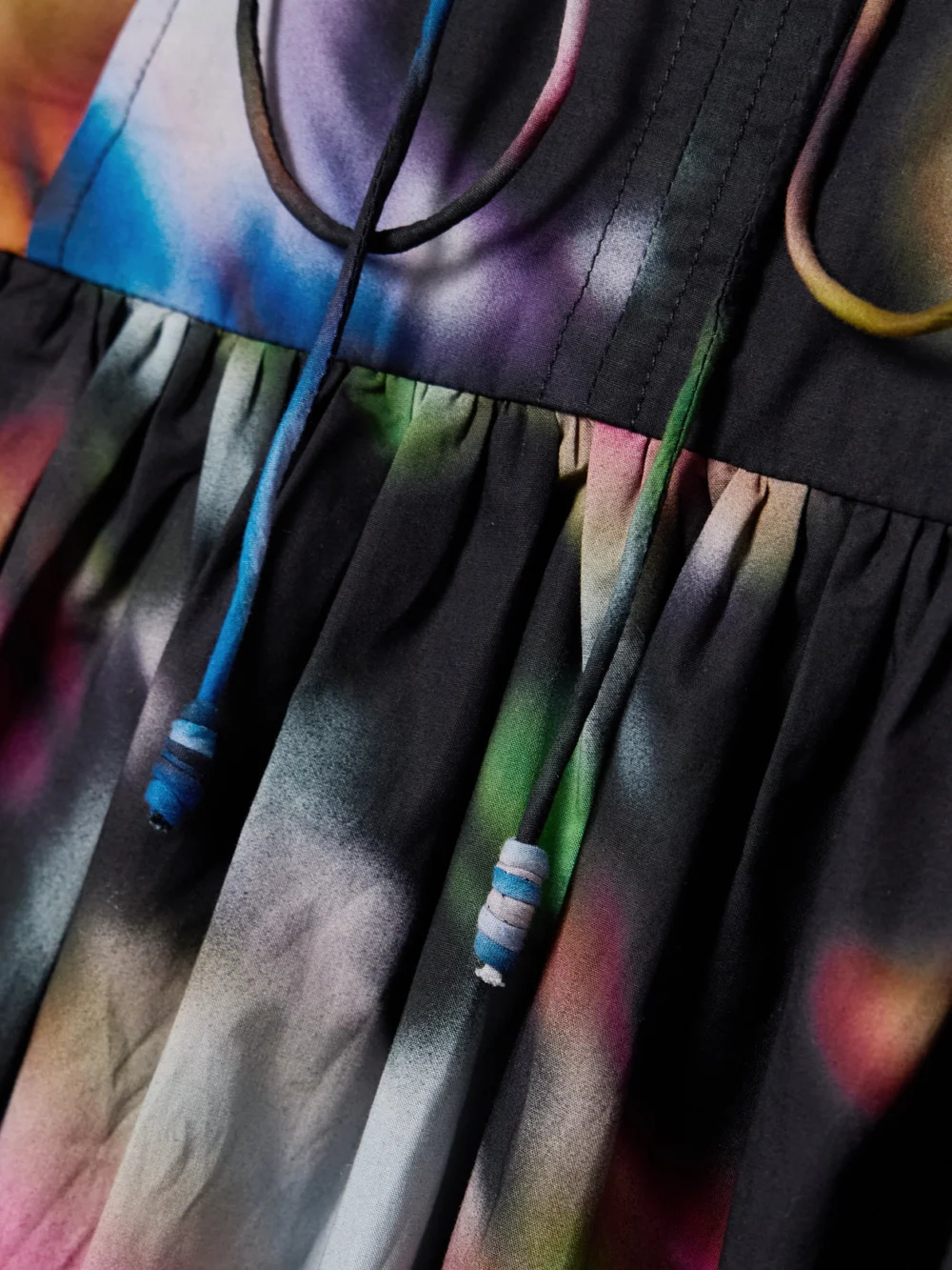 Close-up detail of the Ulla Johnson Kiran Belted Printed Cotton-poplin Midi Dress