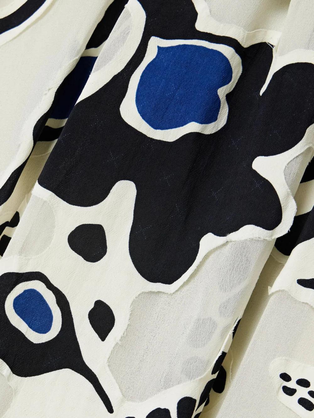 Close-up detail of the Ulla Johnson Leilani Appliquéd Printed Crepe Maxi Dress