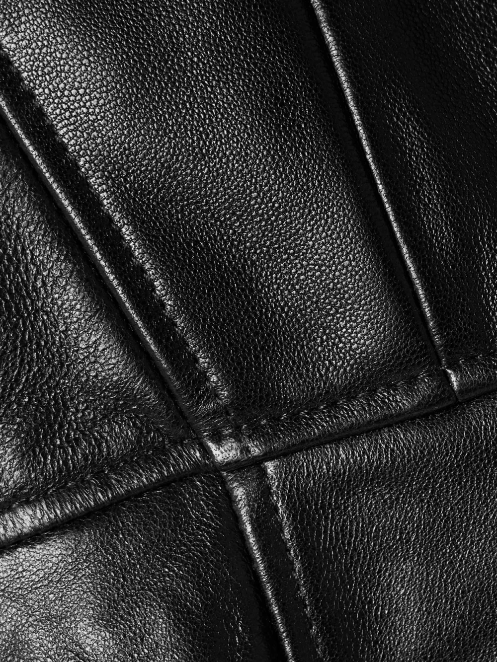 Close-up detail of the Ulla Johnson Thais Paneled Leather Mini Dress