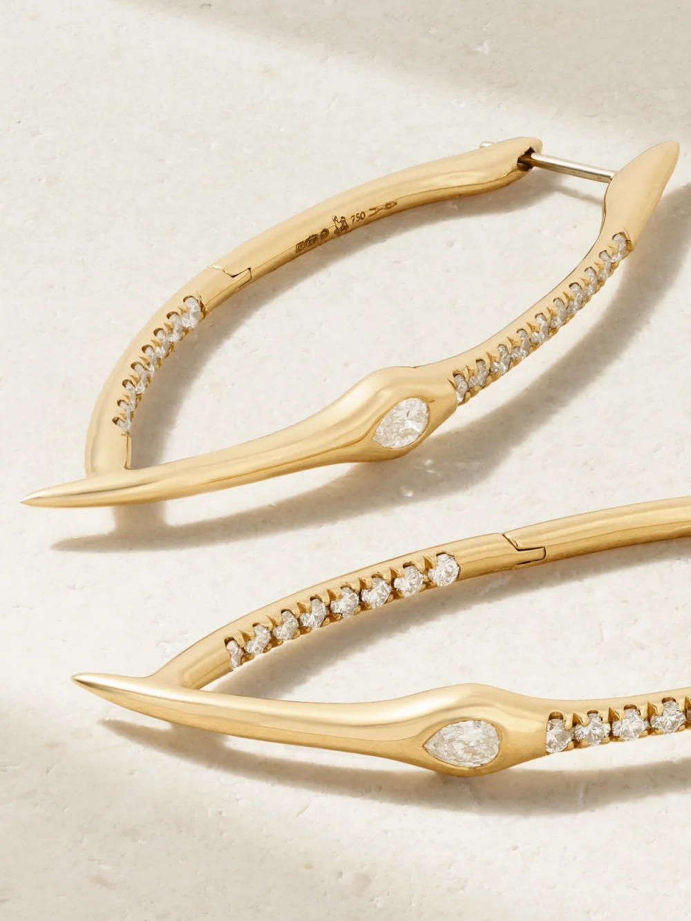 Close-up detail of the Uniform Object Axle 18-karat Gold Diamond Earrings