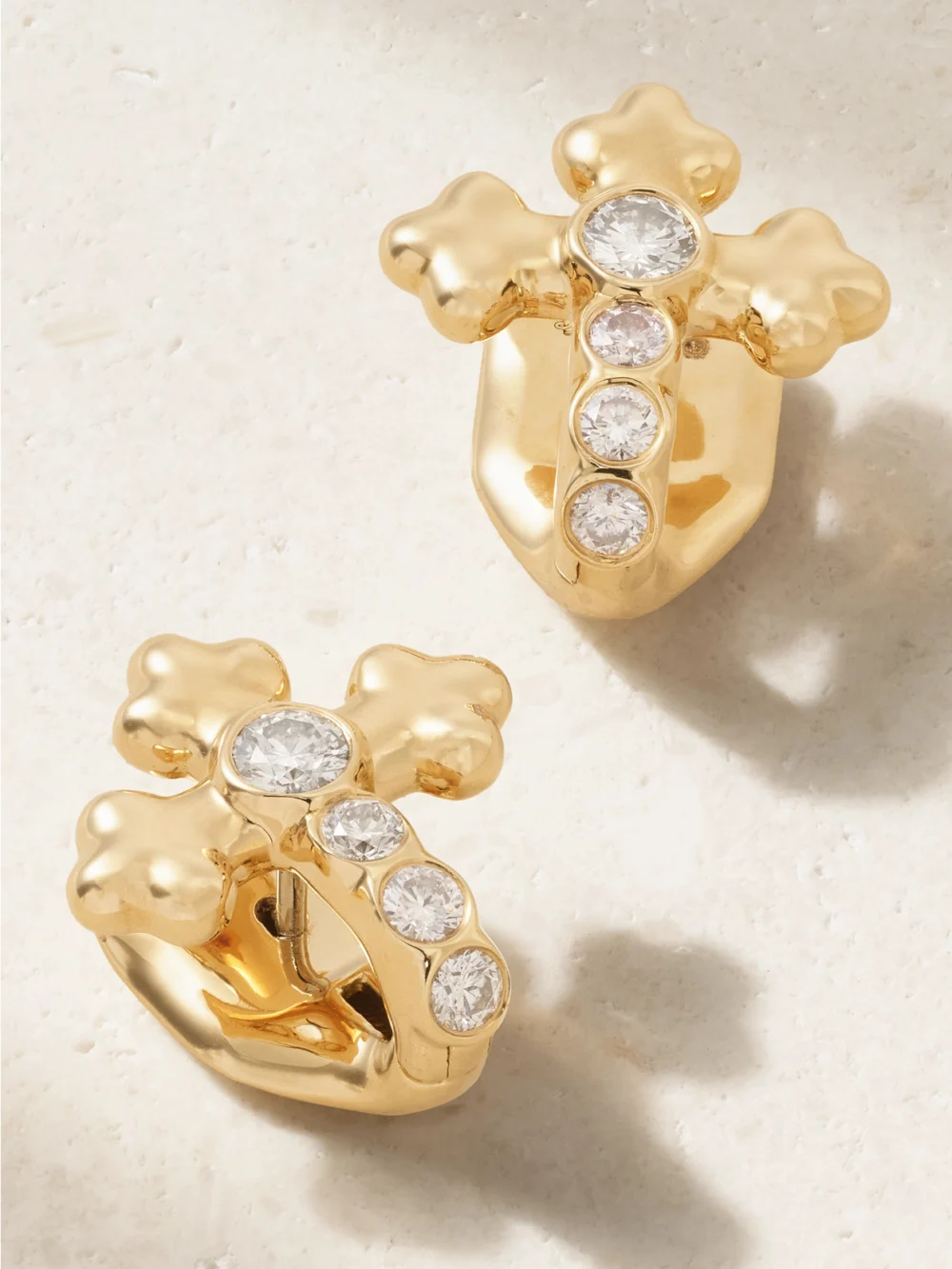 Close-up detail of the Uniform Object Cross 18-karat Gold Diamond Earrings
