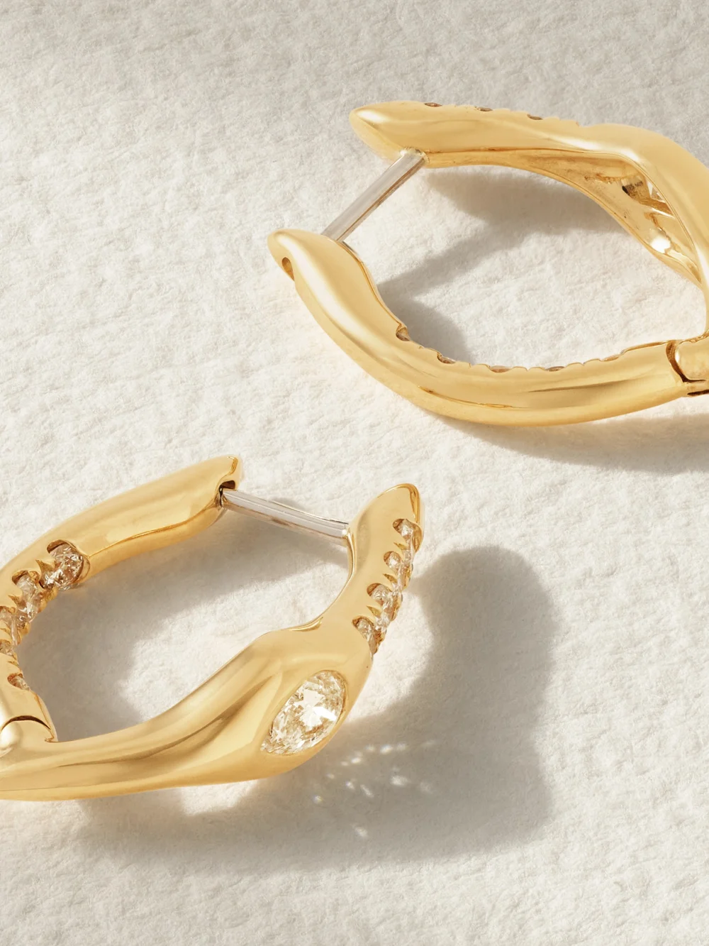 Back view of the Uniform Object Mini Axle 18-karat Gold Diamond Earrings