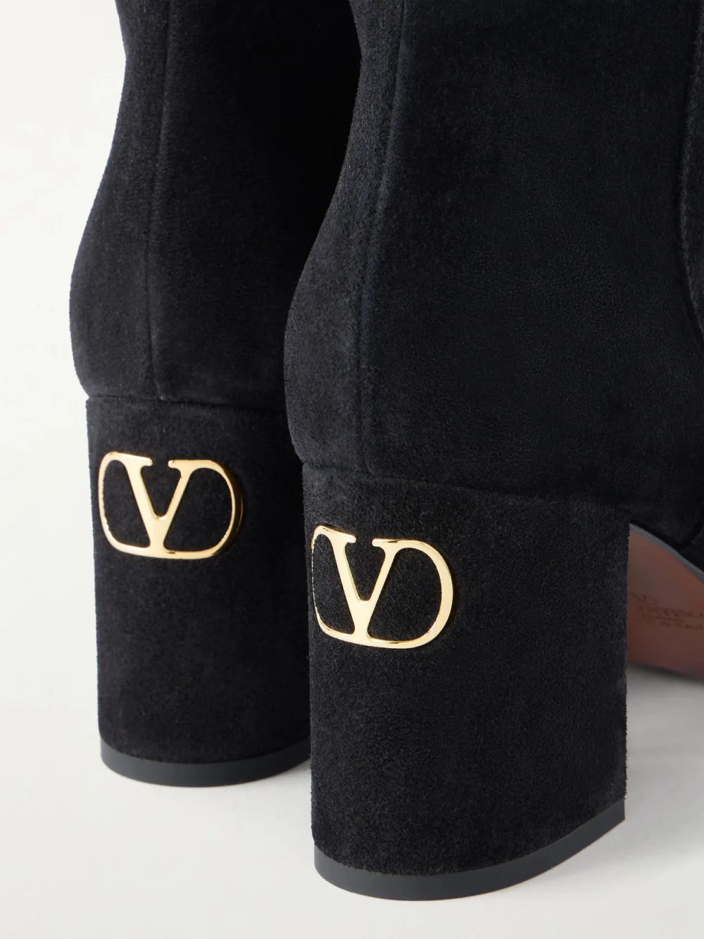 Close-up detail of the Valentino Garavani 75 Bootie Fawcette Suede Ankle Boots