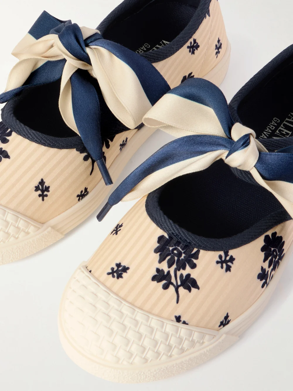 Close-up detail of the Valentino Garavani Bay By Bay Ballerina Rubber-trimmed Printed Silk-jacquard Sneakers