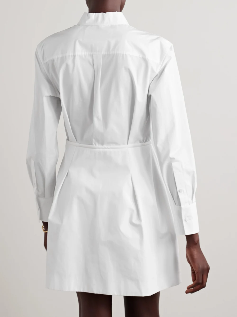Back view of the Valentino Garavani Bow-detailed Pleated Cotton-poplin Mini Shirt Dress