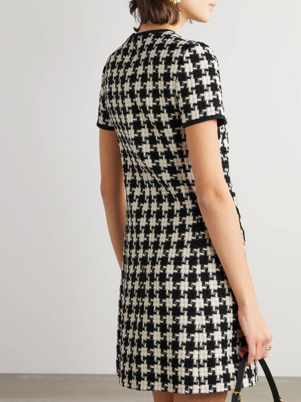 Back view of the Valentino Garavani Bow-embellished Crepe-trimmed Checked Tweed Mini Dress
