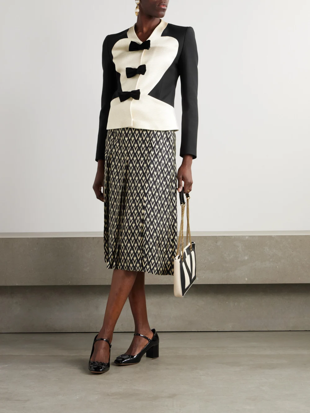 Valentino Garavani Bow-embellished Ribbed Cotton-blend and Wool and Silk-blend Crepe Jacket, worn by a model