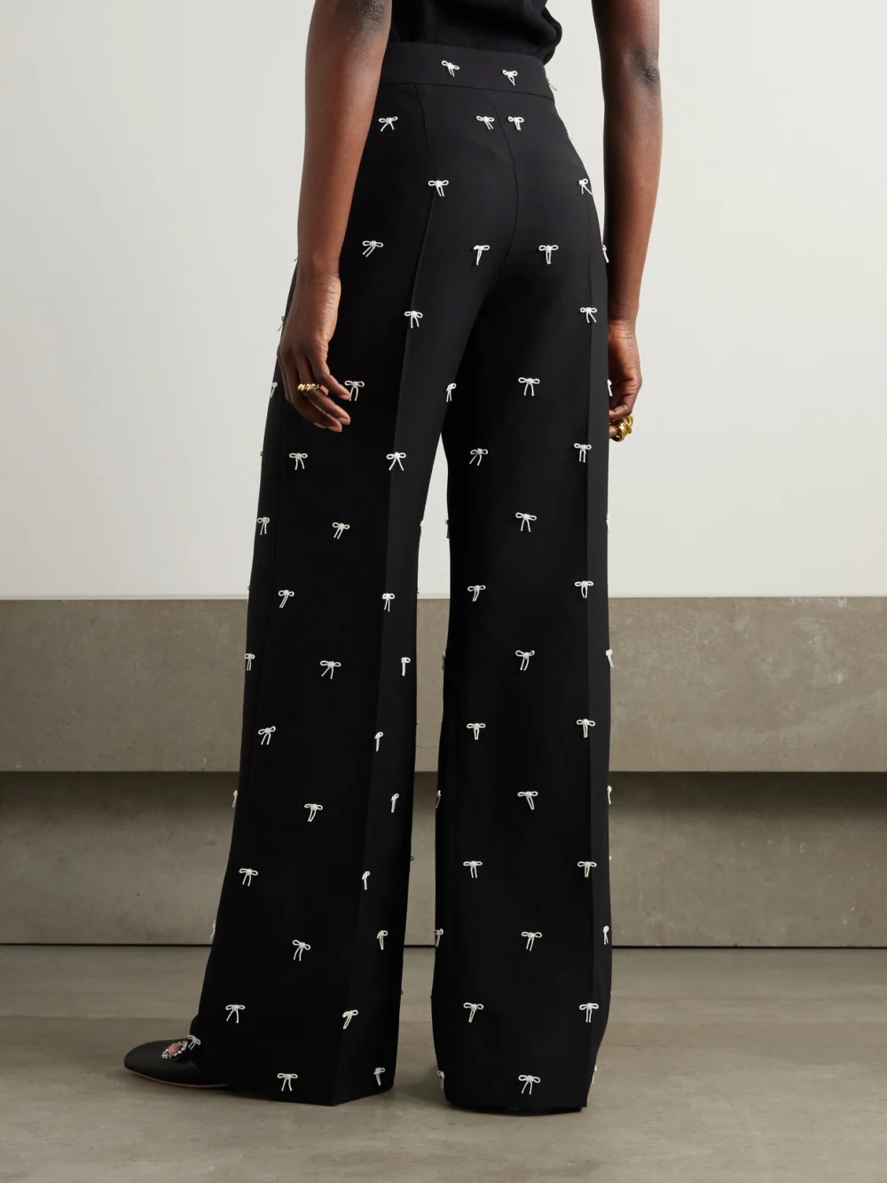 Back view of the Valentino Garavani Bow-embellished Wool and Silk-blend Twill Wide-leg Pants