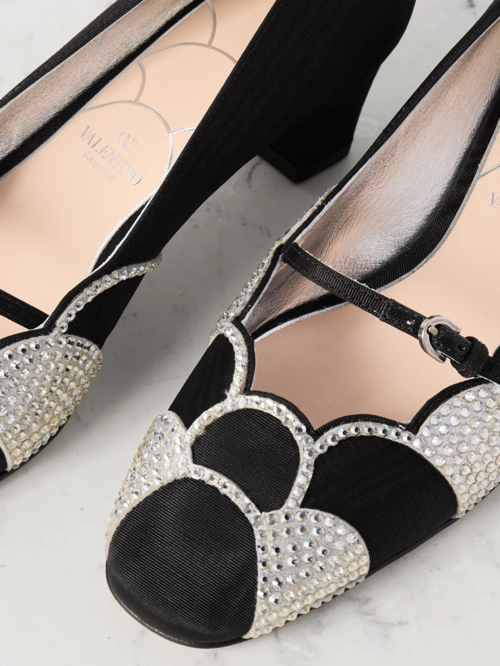 Close-up detail of the Valentino Garavani Bowow 45 Crystal-embellished Suede-trimmed Moiré Pumps