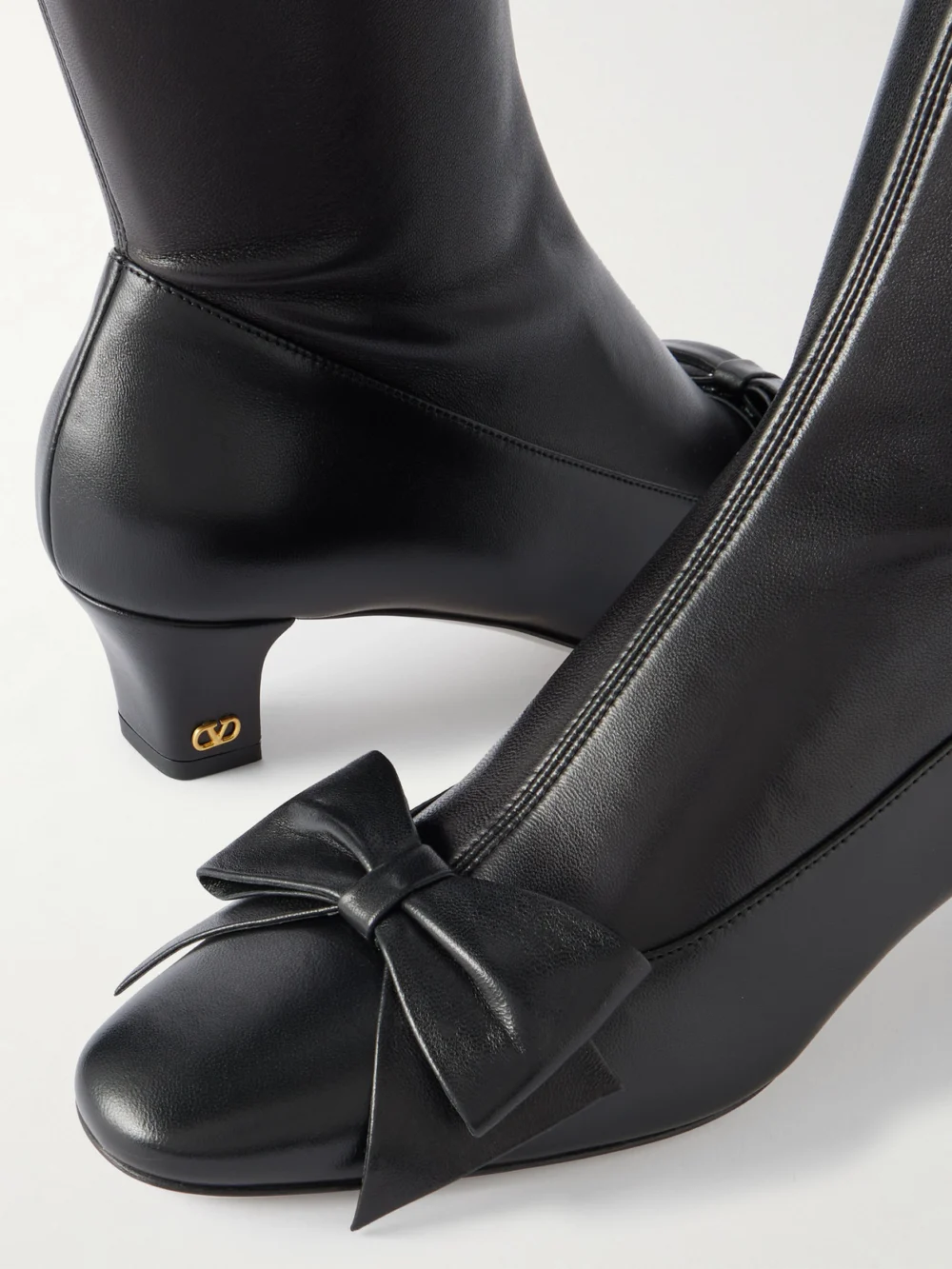 Close-up detail of the Valentino Garavani Bowow 45 Leather Over-the-knee Boots