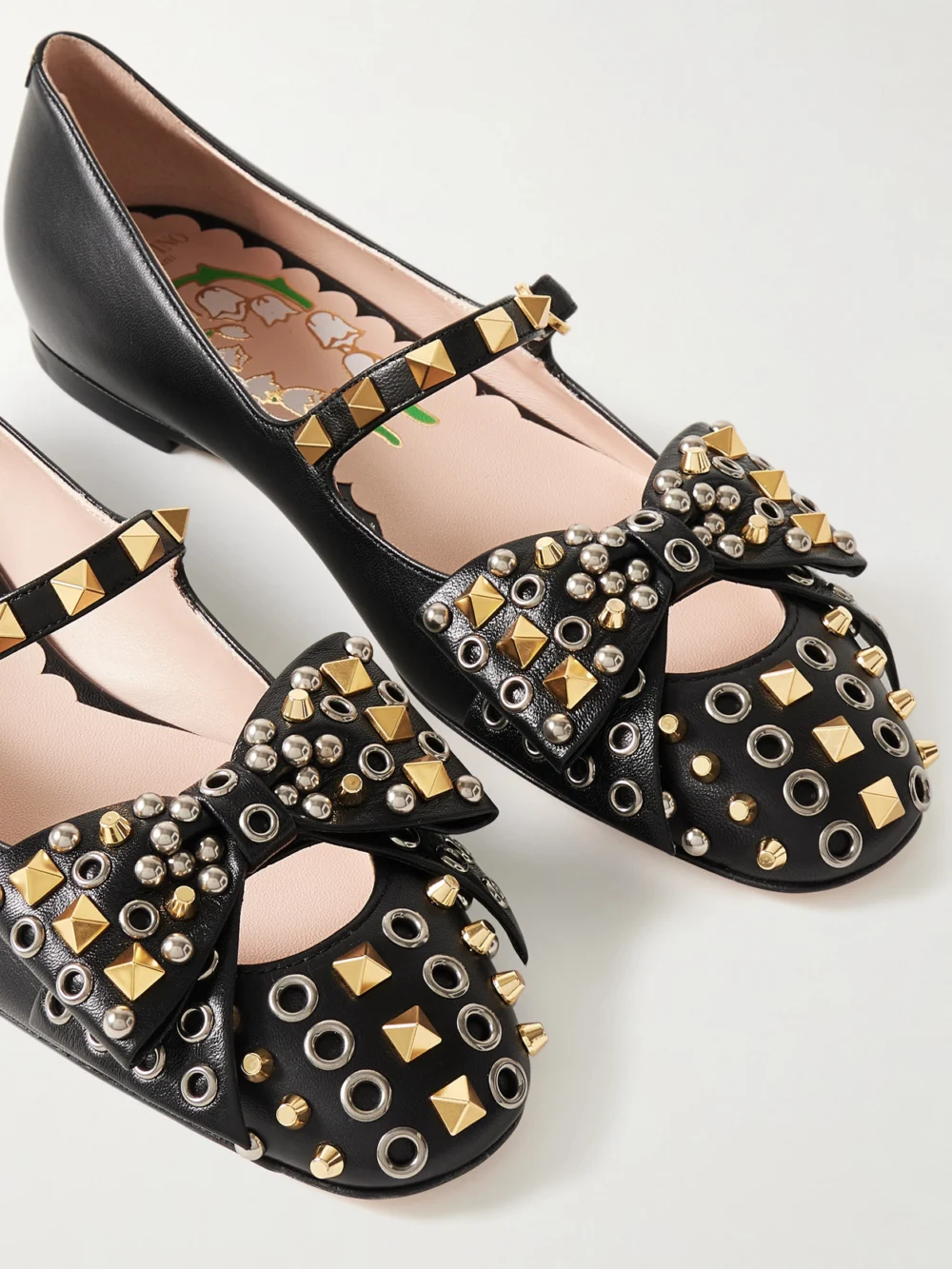 Close-up detail of the Valentino Garavani Bowow Embellished Leather Mary Jane Ballet Flats