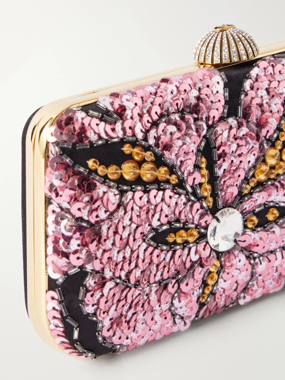 Close-up detail of the Valentino Garavani Carry Secrets Embellished Satin Clutch