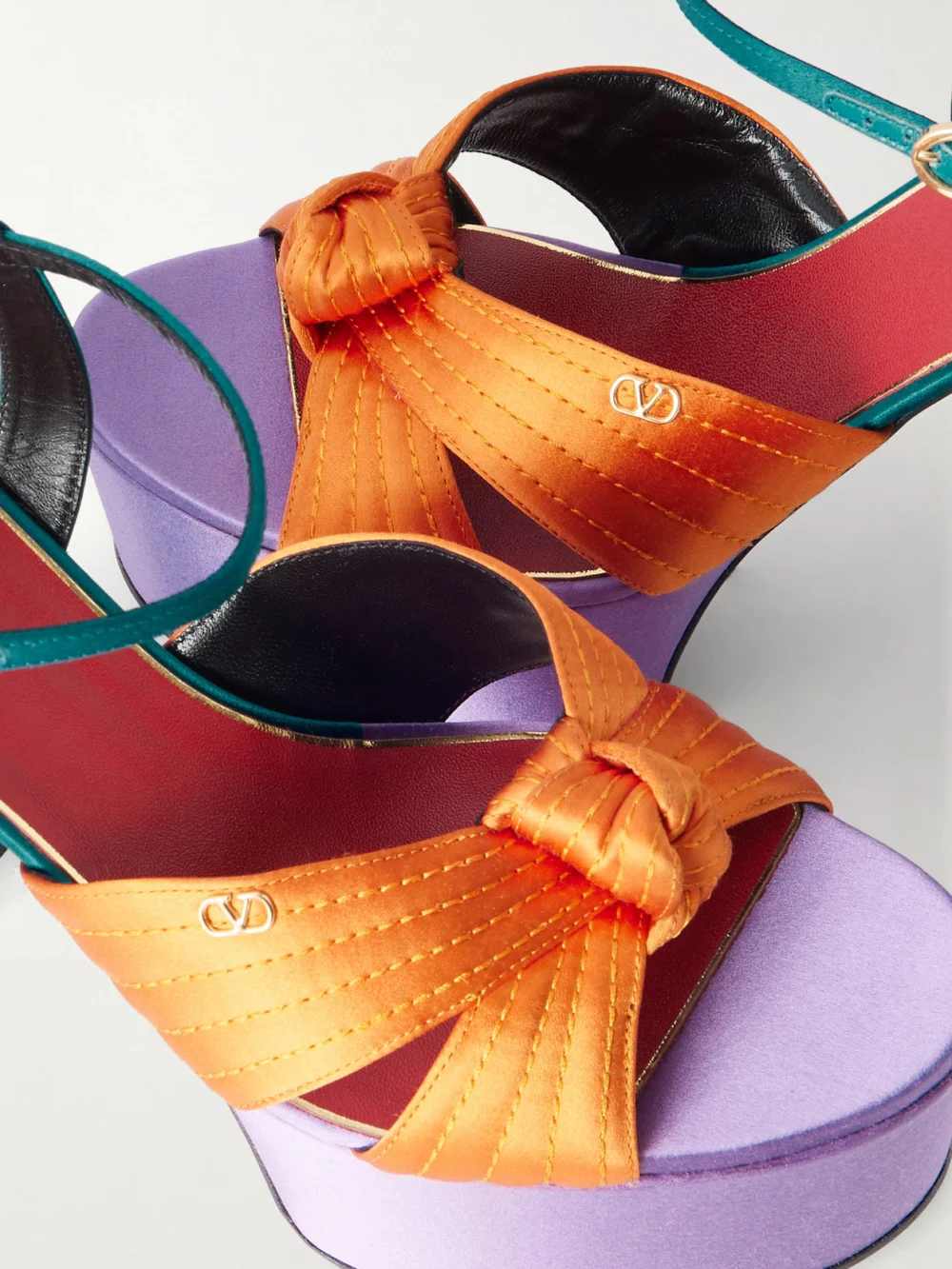 Close-up detail of the Valentino Garavani Crasher 125 Vlogo-embellished Knotted Satin Sandals