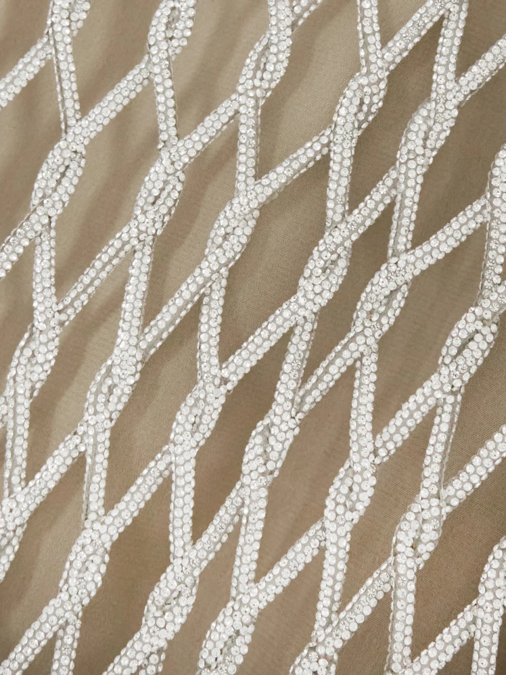 Close-up detail of the Valentino Garavani Crystal-embellished Mesh Mini Dress