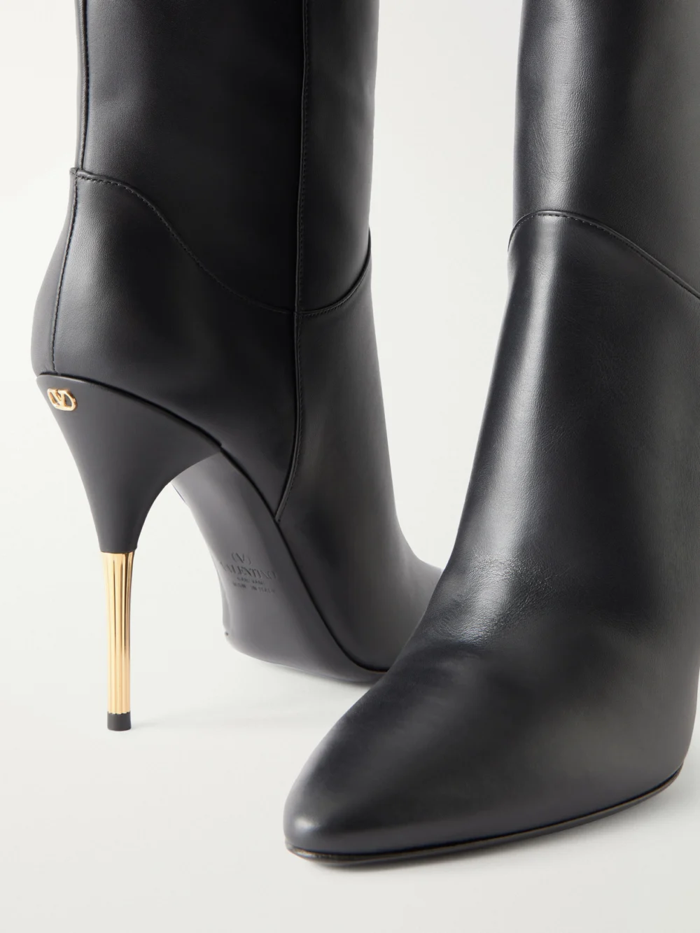 Close-up detail of the Valentino Garavani Deboot 105 Paneled Leather Over-the-knee Boots