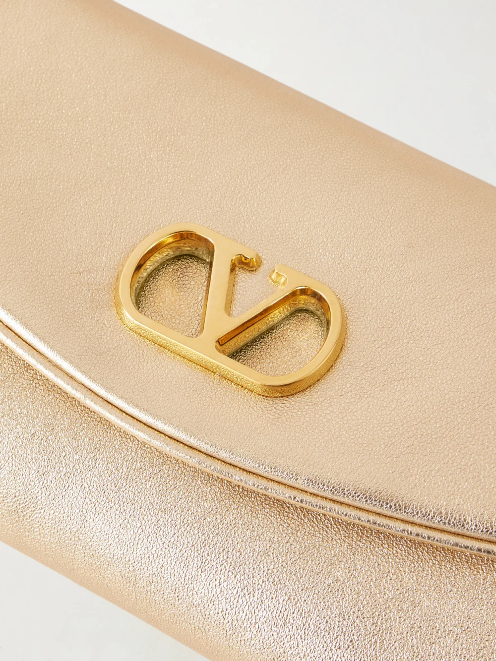Close-up detail of the Valentino Garavani Devain Metallic Leather Shoulder Bag
