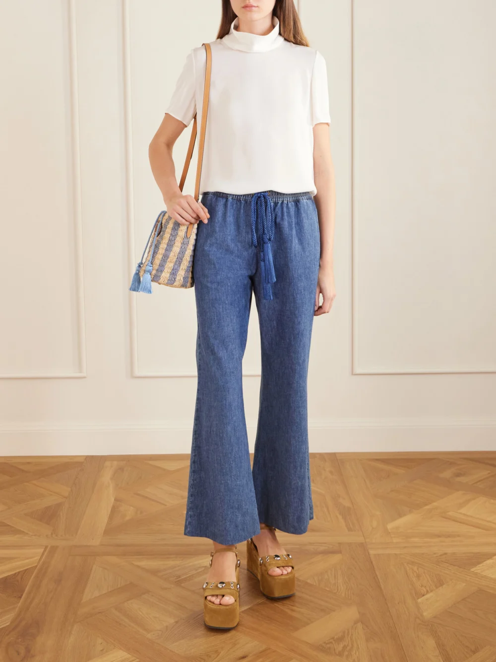 Valentino Garavani Embellished Striped Leather-trimmed Raffia Bucket Bag, styled view