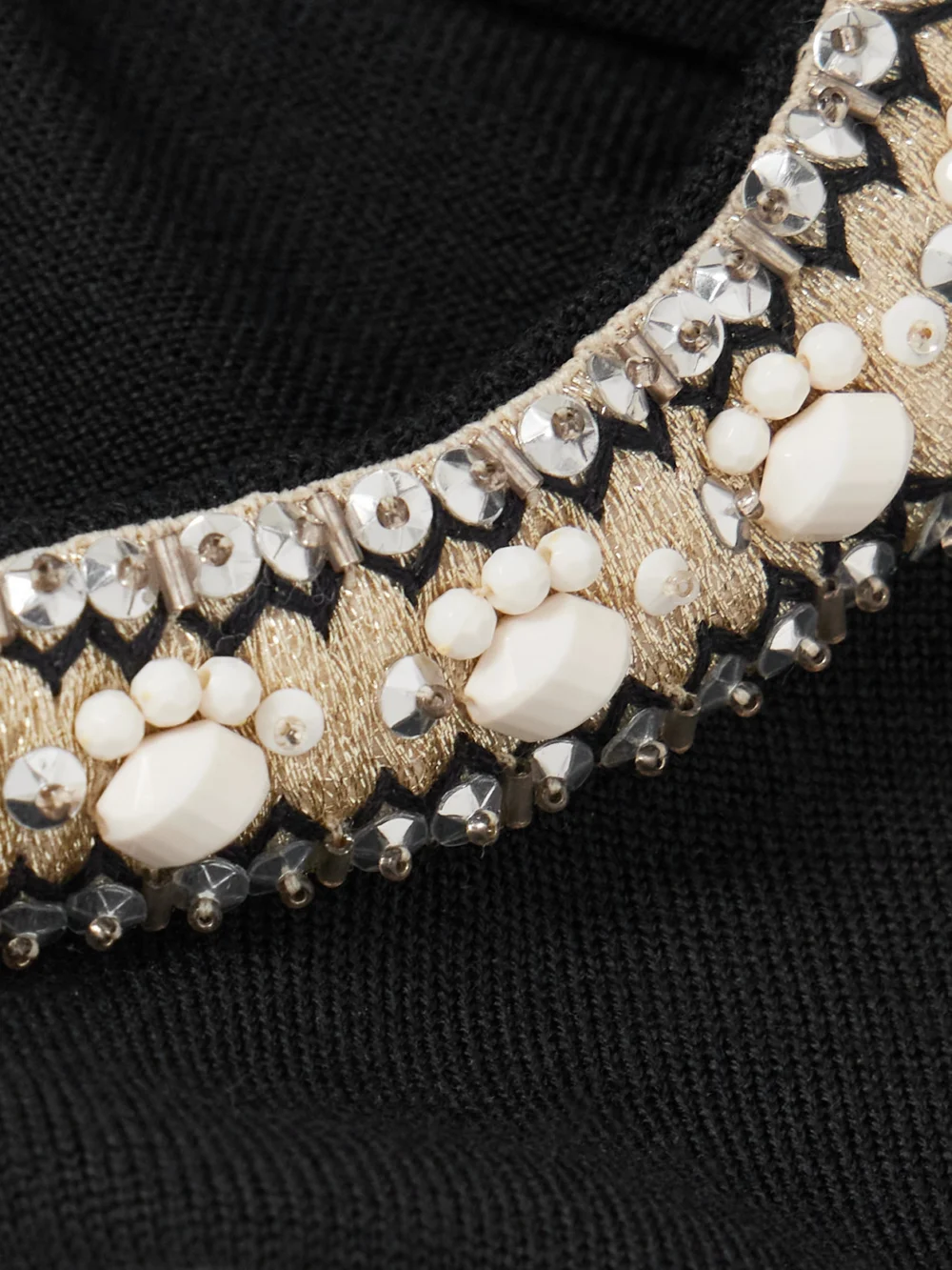 Close-up detail of the Valentino Garavani Embellished Virgin Wool Sweater