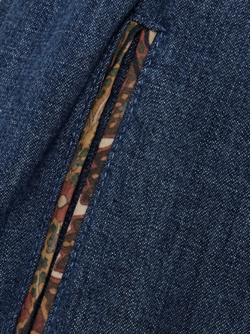 Close-up detail of the Valentino Garavani Embroidered Chambray Tapered Pants