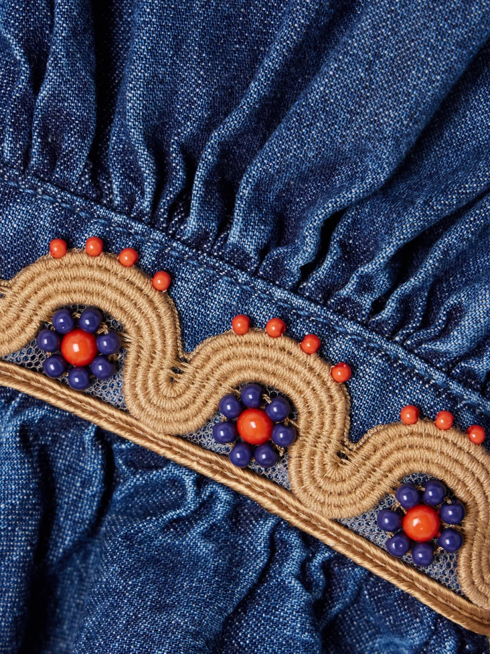 Close-up detail of the Valentino Garavani Embroidered Ruffled Embellished Chambray Top