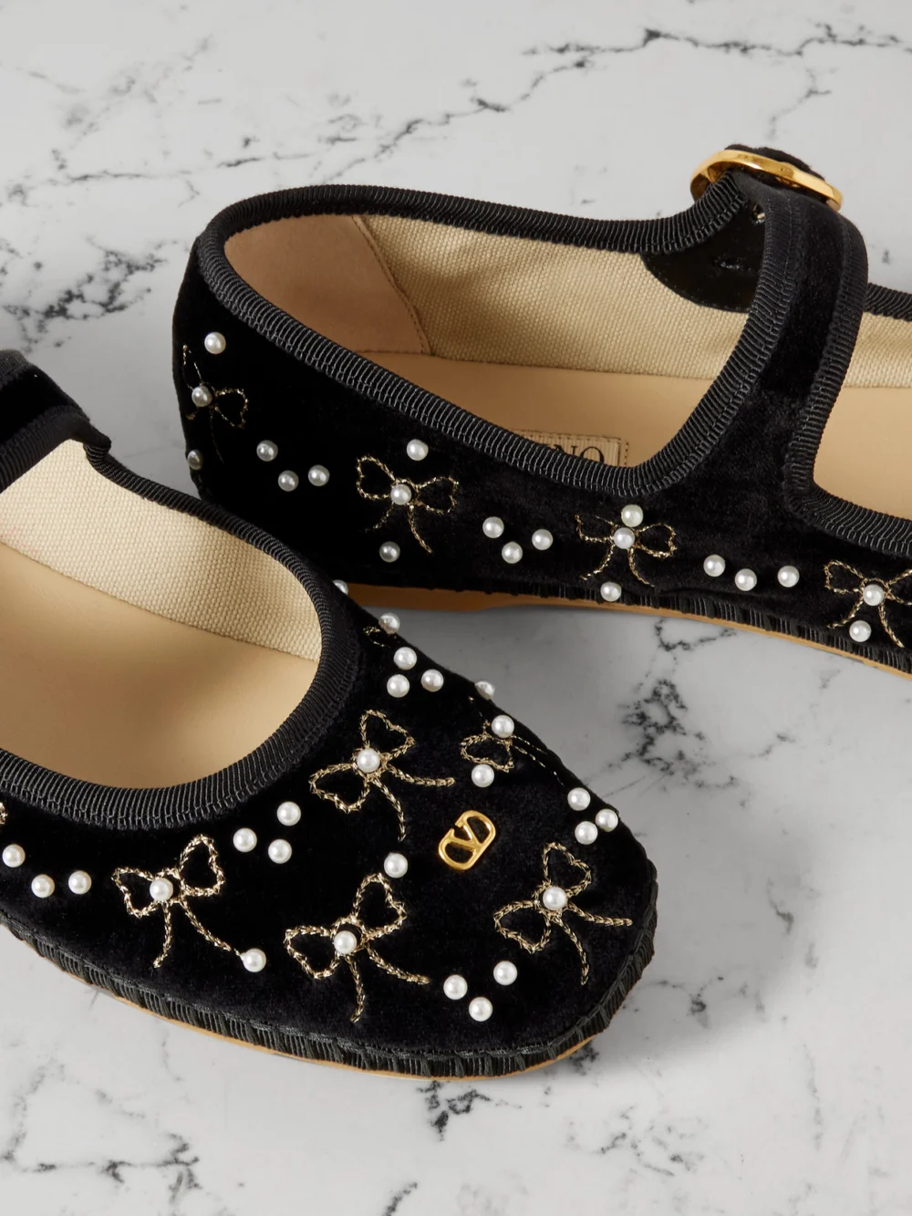 Close-up detail of the Valentino Garavani Endouce Embellished Grosgrain-trimmed Velvet Mary Jane Ballet Flats