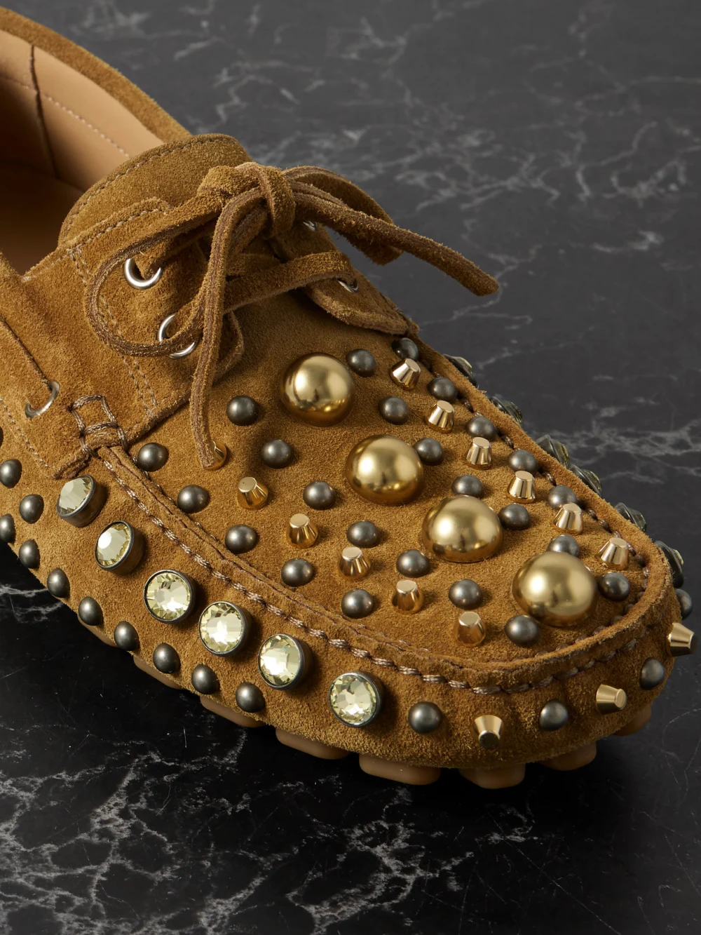 Close-up detail of the Valentino Garavani Fastaway Embellished Suede Loafers