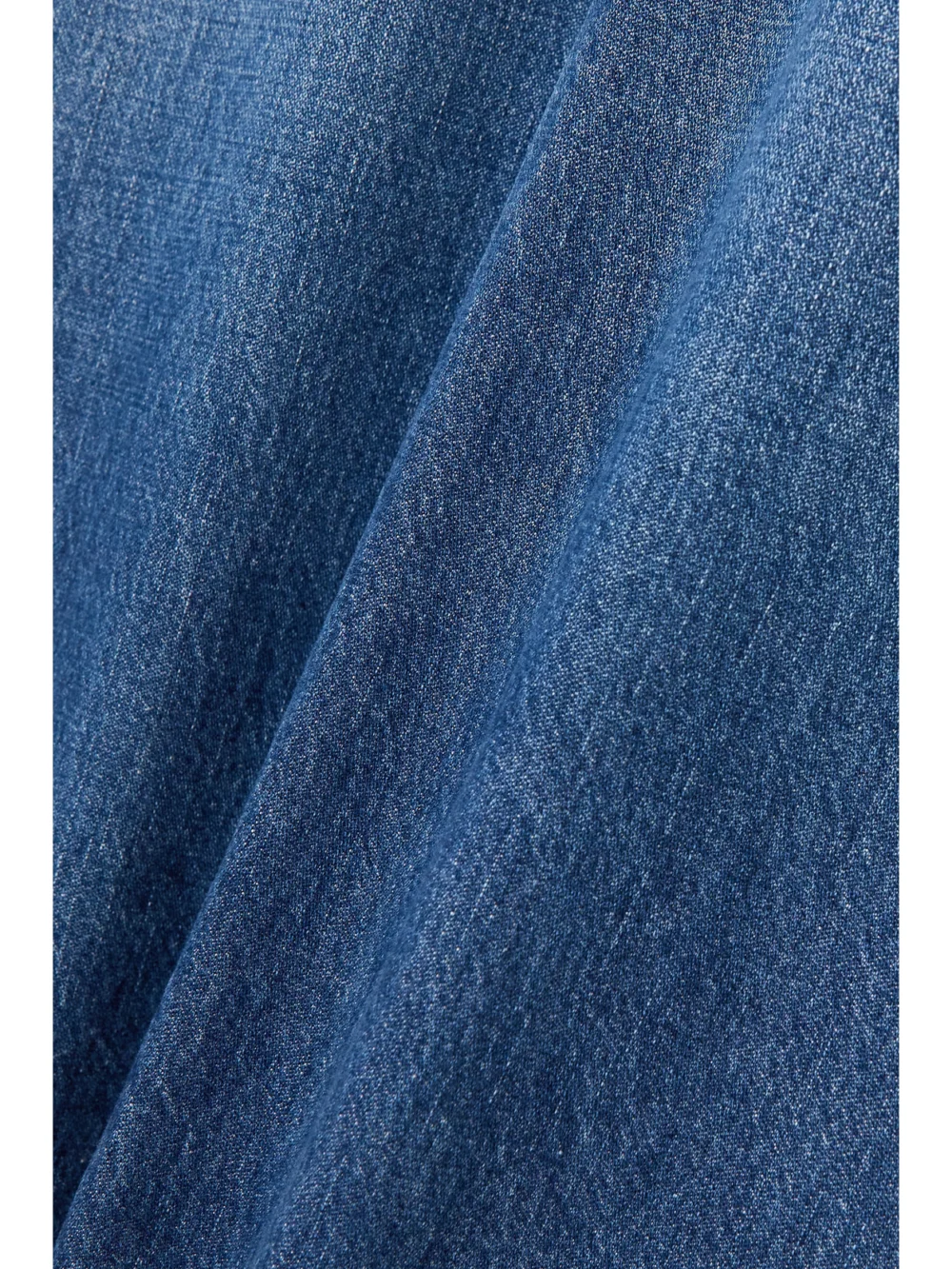 Close-up detail of the Valentino Garavani Flared Denim Maxi Skirt