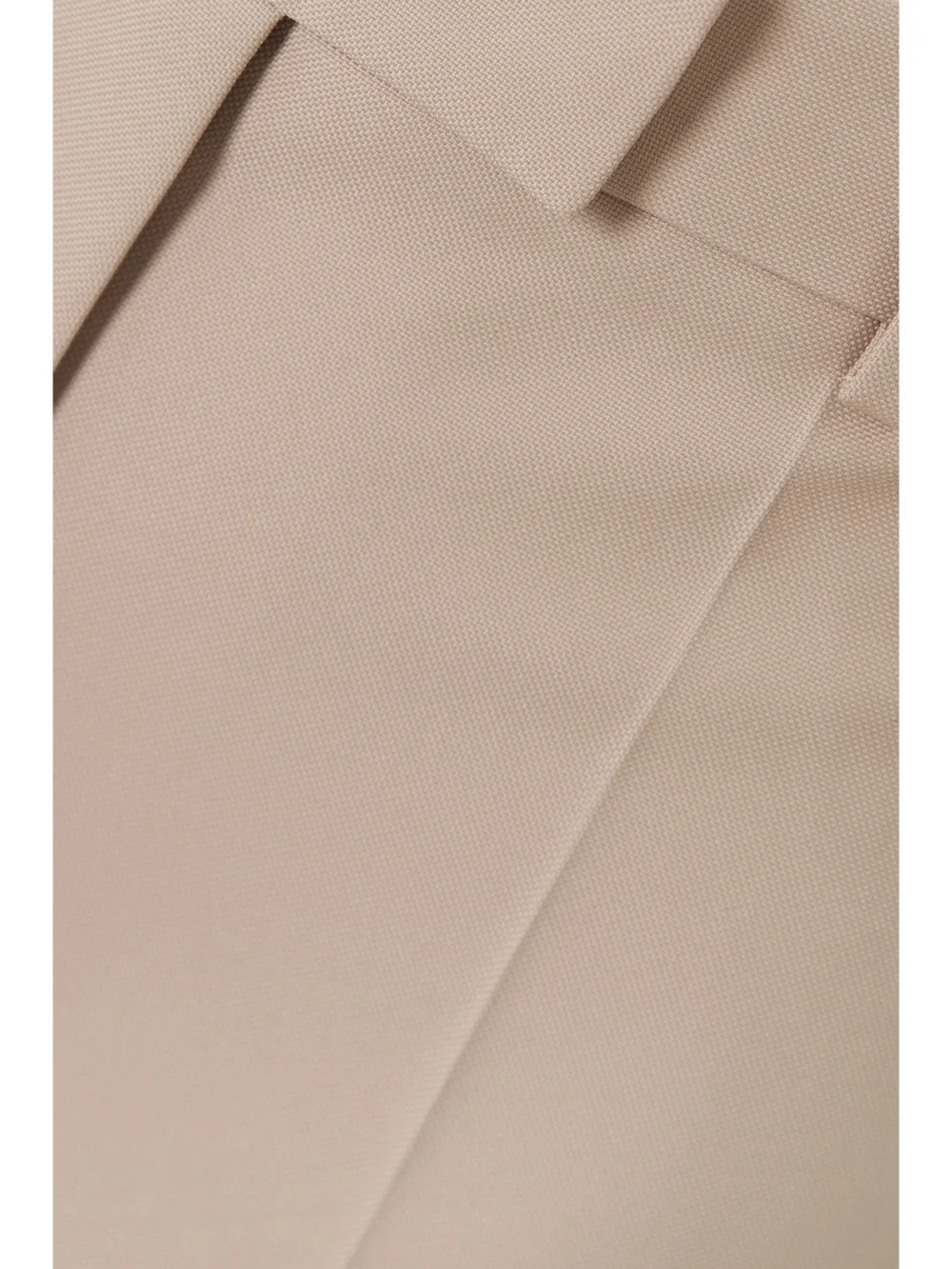 Close-up detail of the Valentino Garavani Grain De Poudre Wool Straight-leg Pants