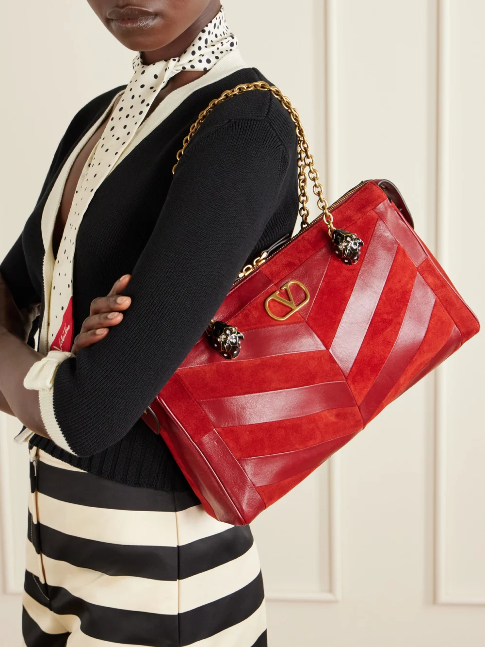 Valentino Garavani Growl Medium Embellished Leather Shoulder Bag, styled view