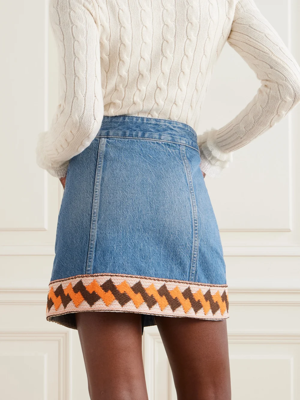 Back view of the Valentino Garavani Jacquard-trimmed Paneled Denim Mini Skirt