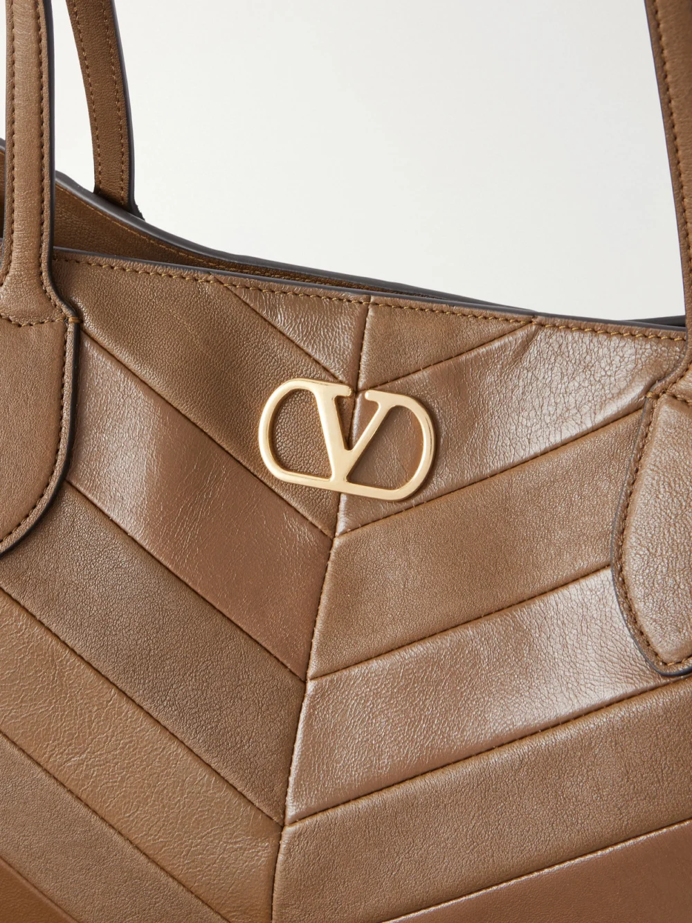 Close-up detail of the Valentino Garavani Jean Medium Chevron Leather Tote