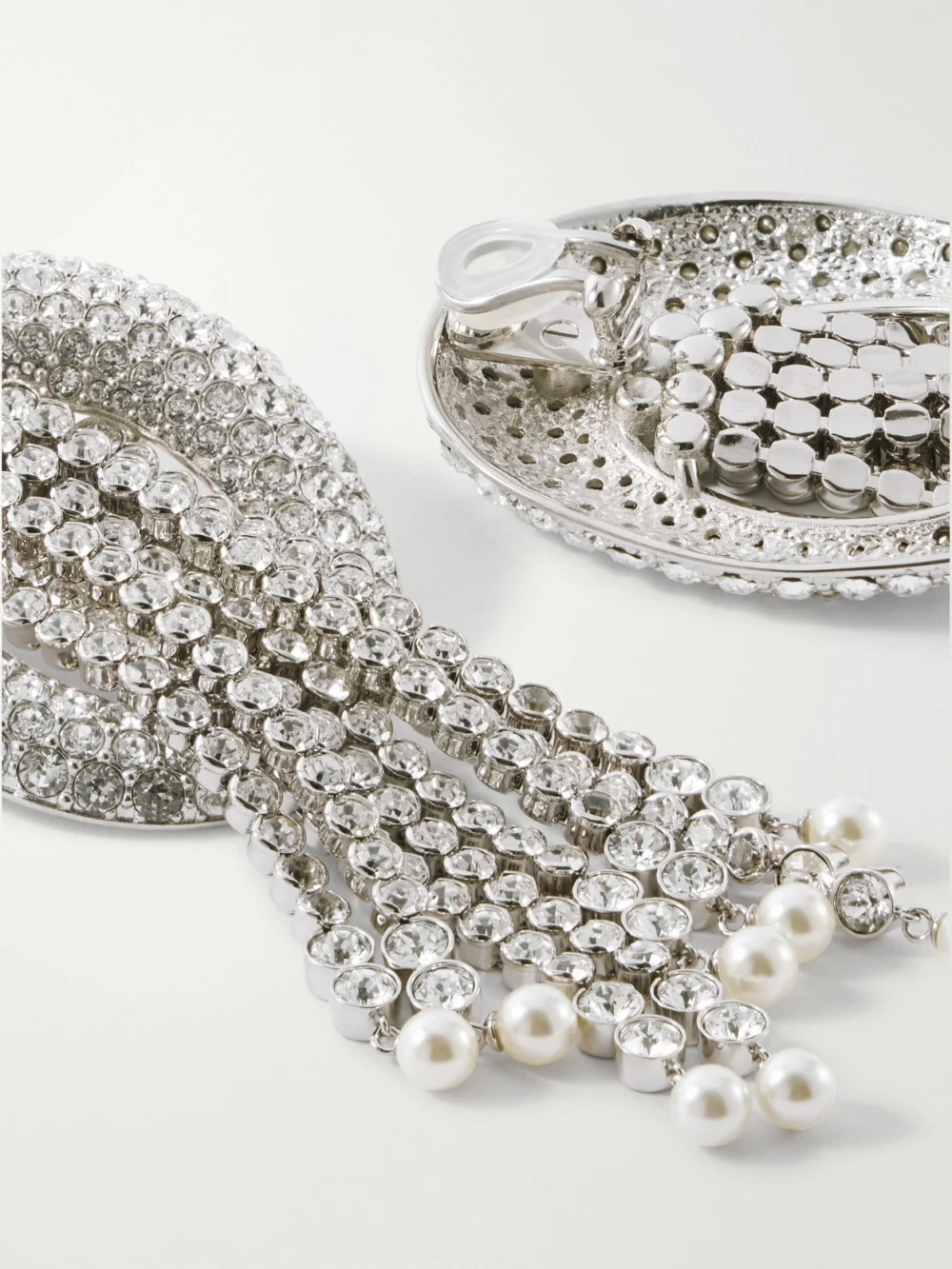 Close-up detail of the Valentino Garavani Kabarett Silver-tone Crystal and Bead Earrings