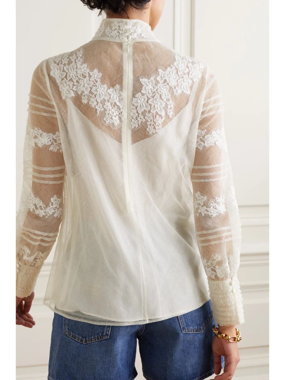 Back view of the Valentino Garavani Lace-trimmed Wool and Silk-blend Mesh Blouse