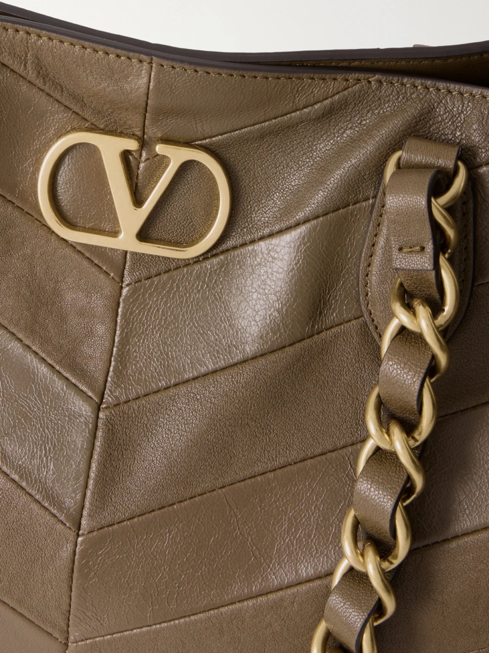 Close-up detail of the Valentino Garavani Laseine Vlogoembellished Leather Tote
