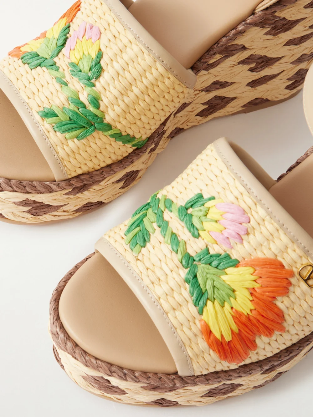 Close-up detail of the Valentino Garavani Leather and Floral-embroidered Raffia Wedge Espadrilles