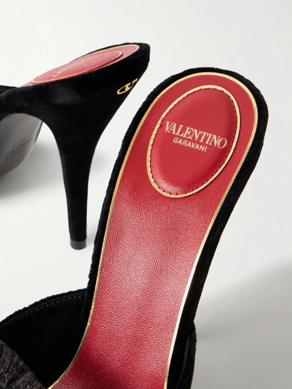 Close-up detail of the Valentino Garavani Marie 105 Bow-embellished Satin-trimmed Velvet Mules