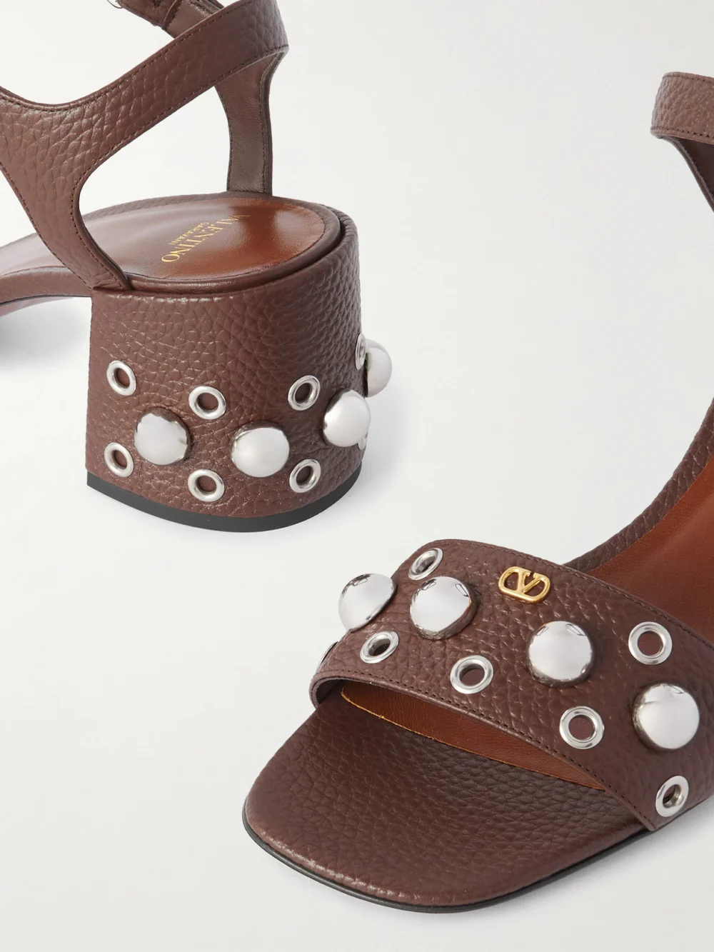 Close-up detail of the Valentino Garavani Nellcôte 60 Embellished Textured-leather Sandals