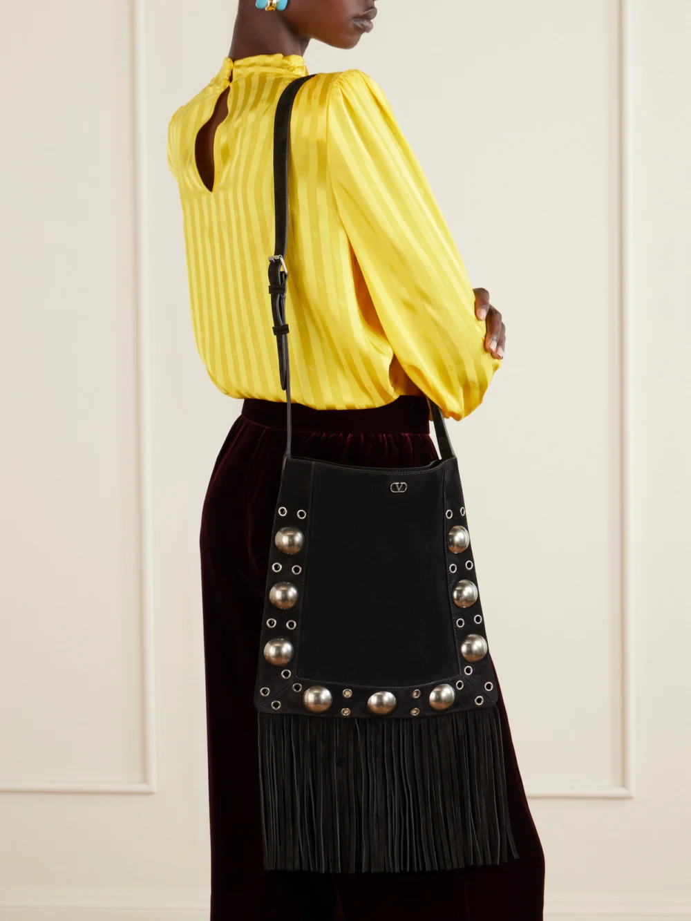 Valentino Garavani Nellcote Medium Fringed Studded Suede Shoulder Bag, styled view