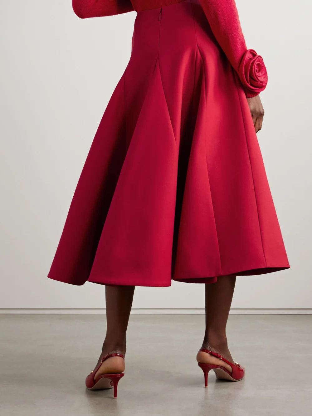 Back view of the Valentino Garavani Paneled Pleated Wool and Silk-blend Crepe Midi Skirt