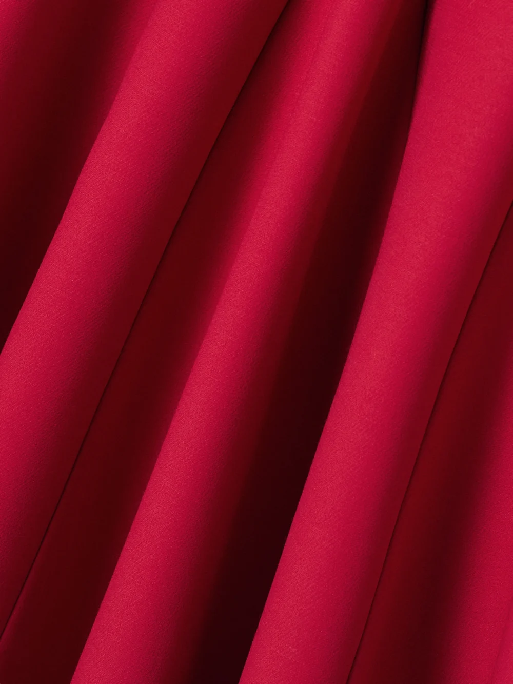 Close-up detail of the Valentino Garavani Paneled Pleated Wool and Silk-blend Crepe Midi Skirt