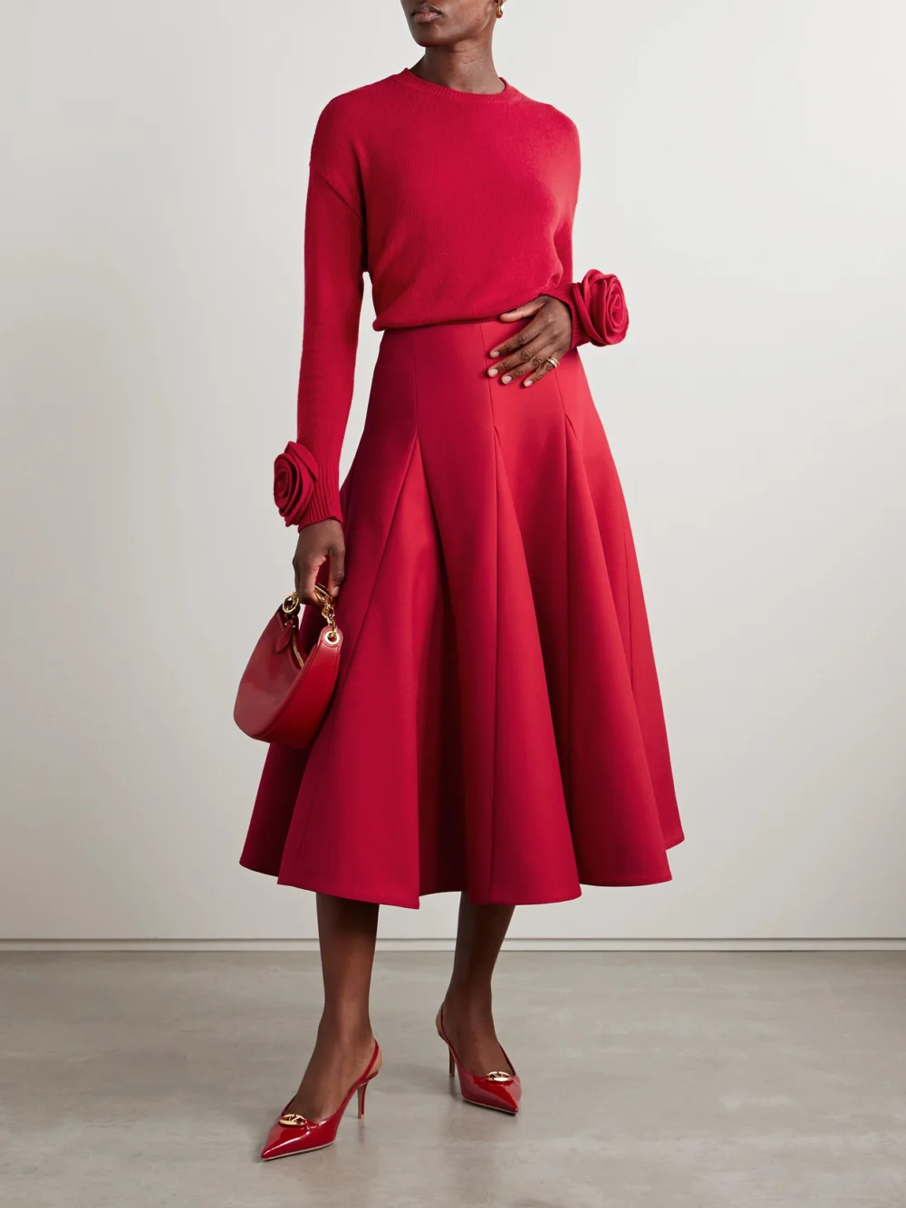 Valentino Garavani Paneled Pleated Wool and Silk-blend Crepe Midi Skirt, worn by a model