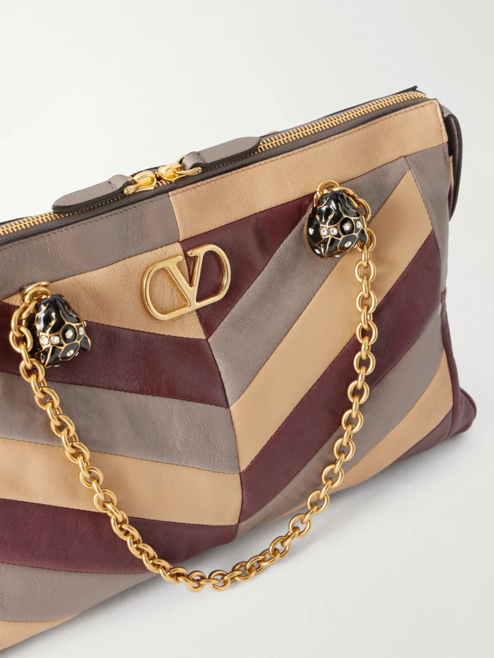 Close-up detail of the Valentino Garavani Panthea Medium Embellished Patchwork Leather Shoulder Bag