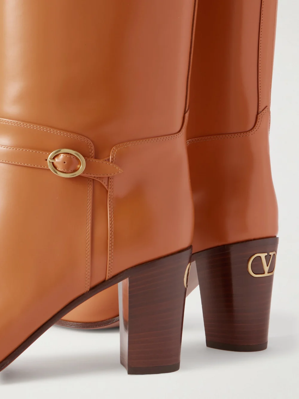 Close-up detail of the Valentino Garavani Pattie 75 Buckle-embellished Leather Boots